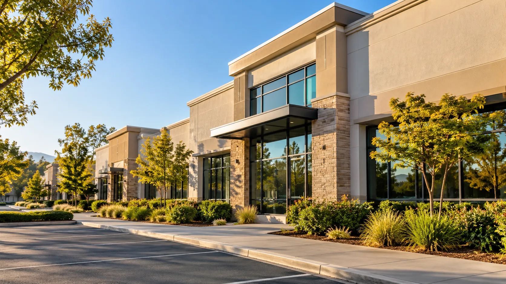 Exterior of modern California commercial building with landscaping and blue sky